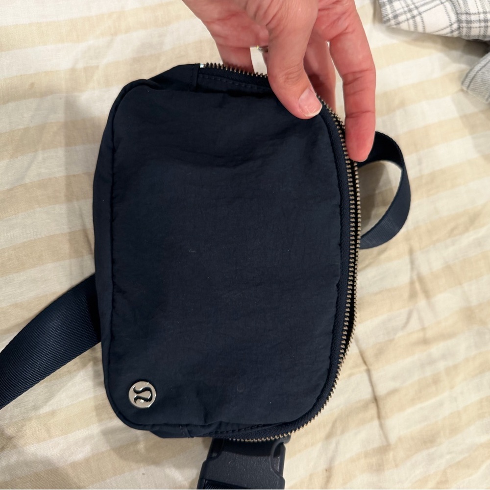 lululemon athletica navy belt bag with silver logo